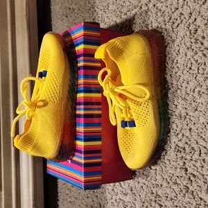 Yellow play shoes. Rainbow bottom. See pictures for details. Size 1.